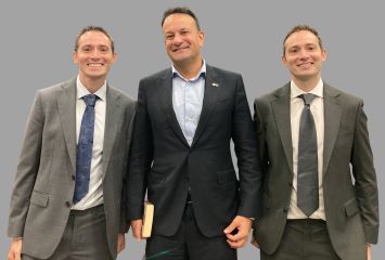 Pictured: Our translators Christopher and Cormac Donaghy with Taoiseach Leo Varadkar, Dublin, 2025